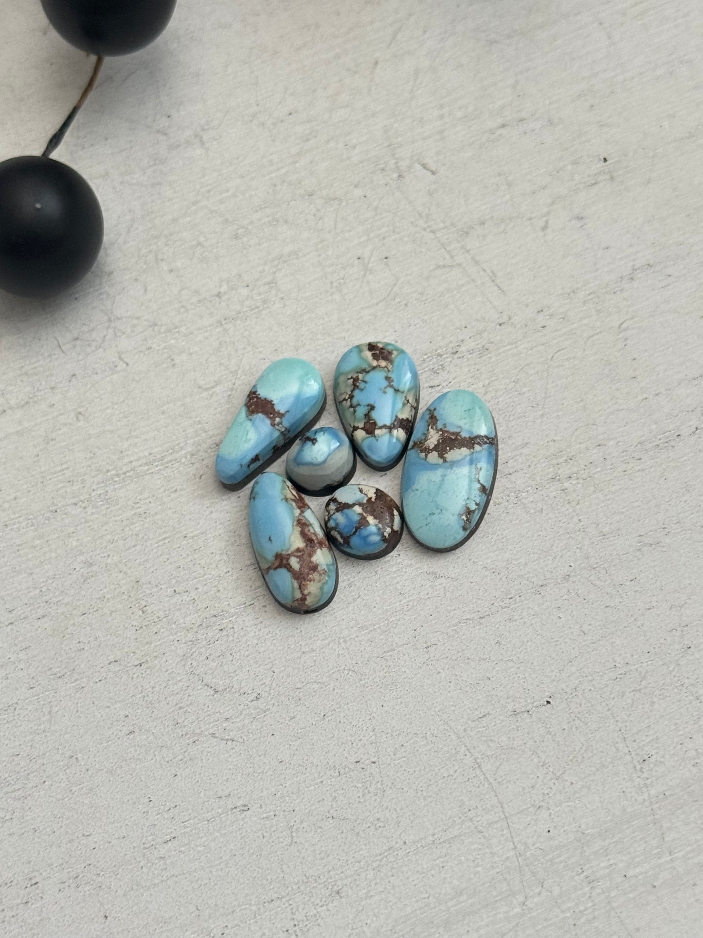 Natural Golden Hills Turquoise Cabs